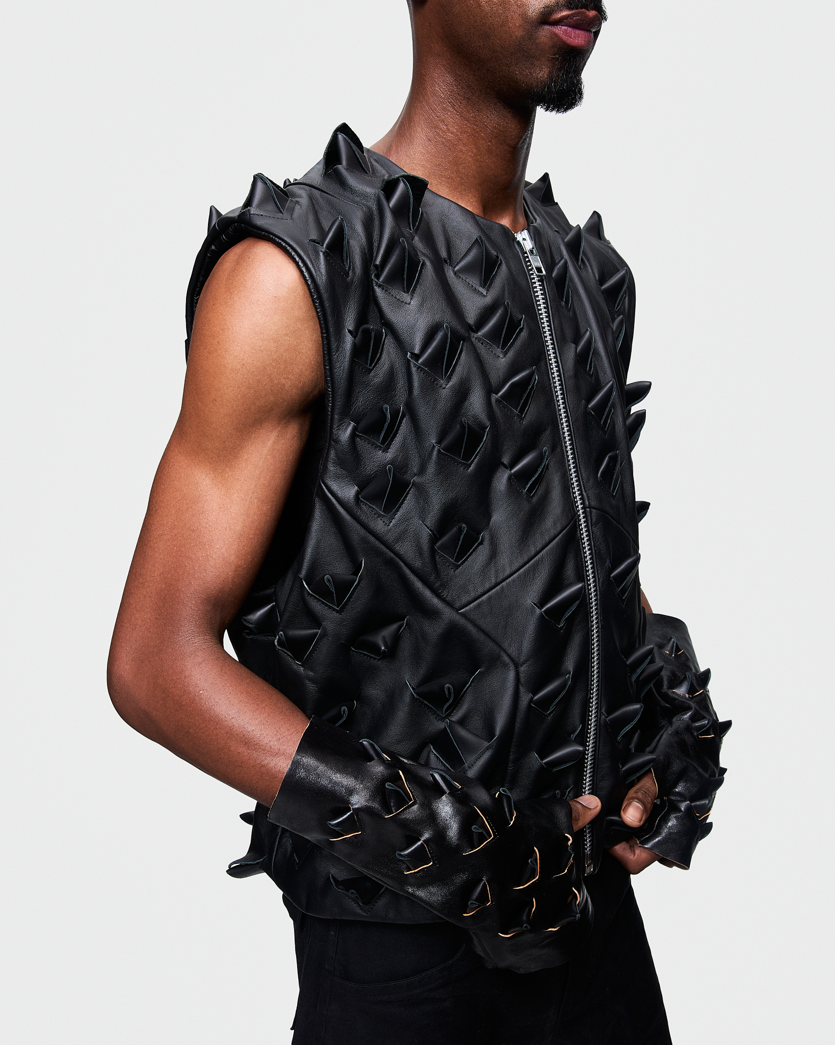- Leather vest<br />- Oversized fit<br />- Croco 3-D leather are applied all over the vest