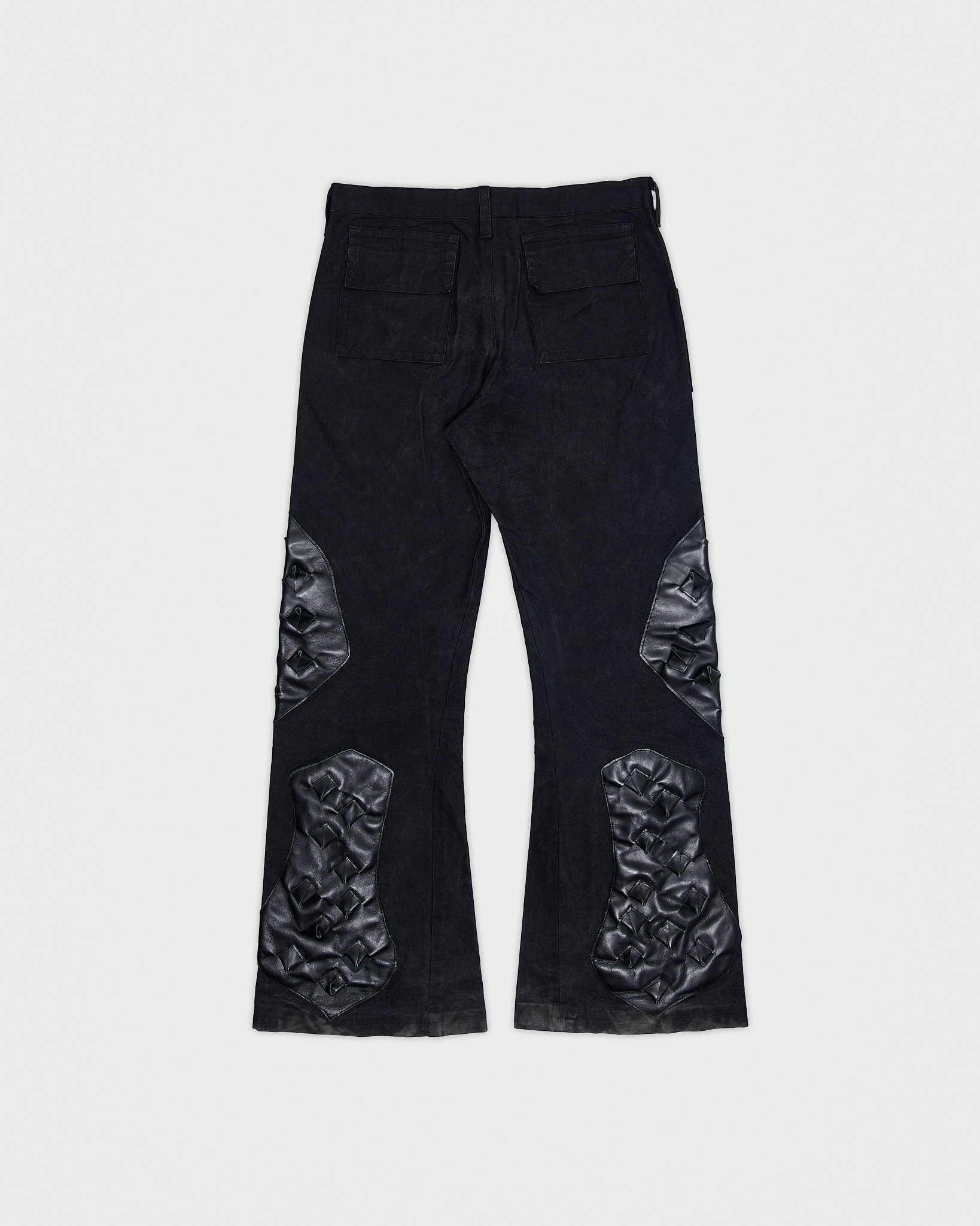 - Slim fit with bootcut leg pants<br />- No side seam<br />- Croco 3-D leather patches