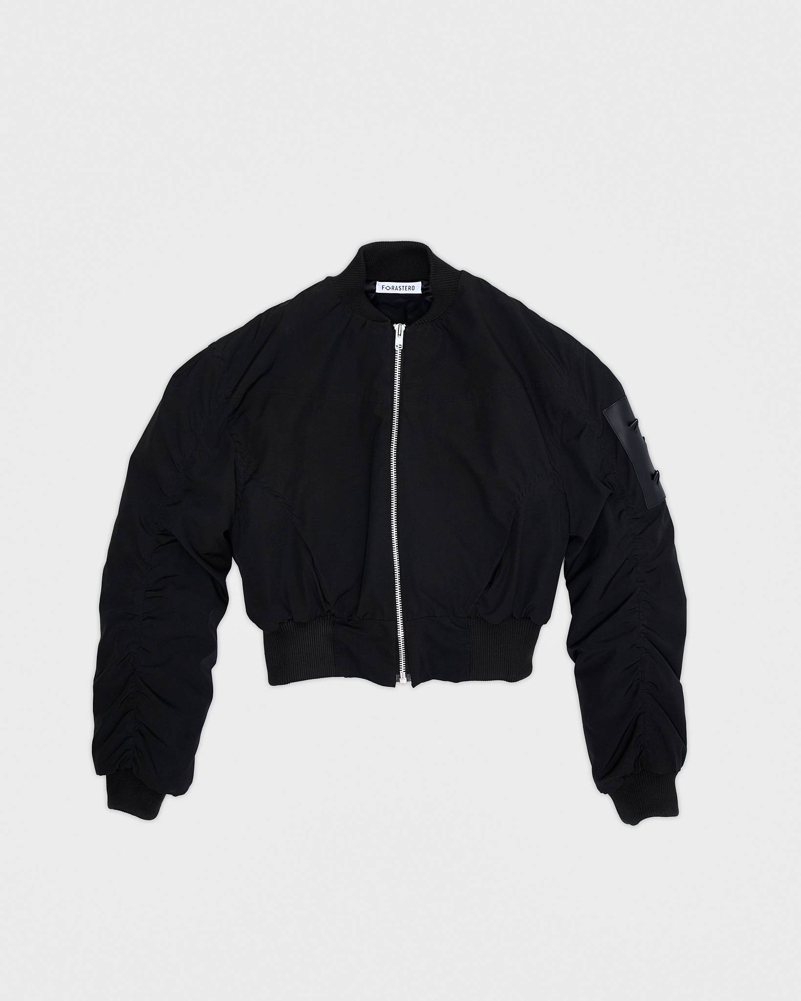 - Croptop padded bomber jacket<br />- Oversize fit<br />- Croco 3-D leather patches<br />- Dropped shoulders