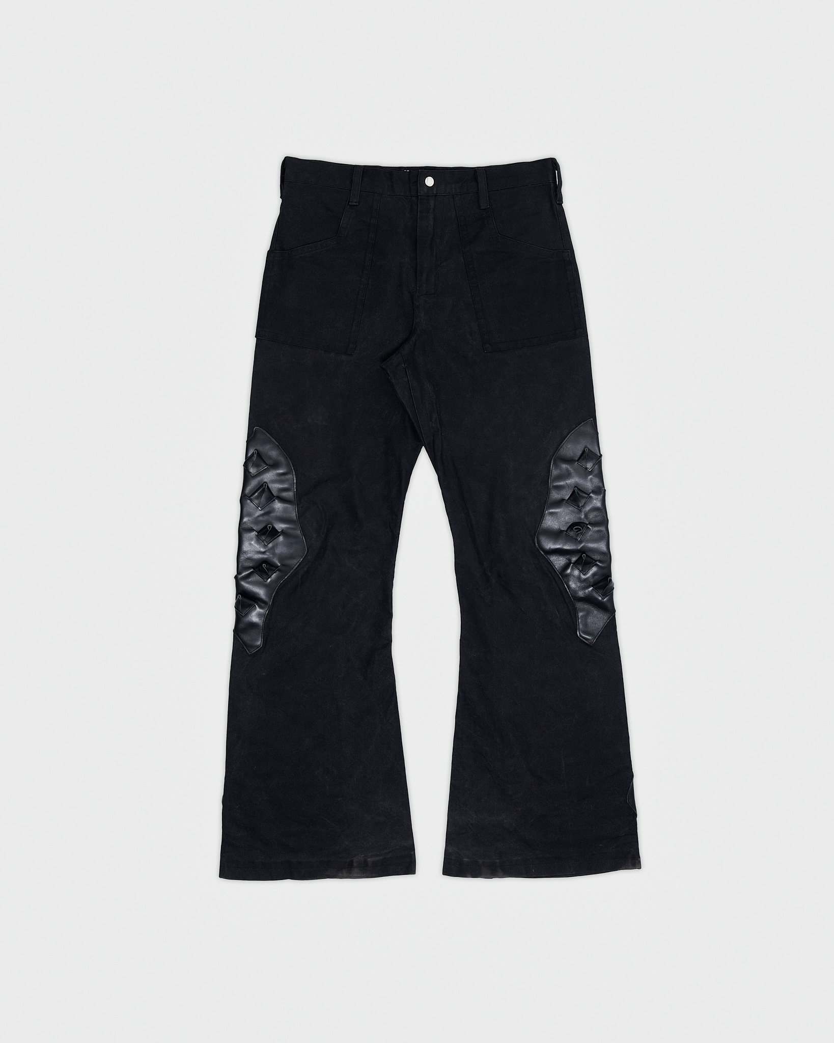 - Slim fit with bootcut leg pants<br />- No side seam<br />- Croco 3-D leather patches