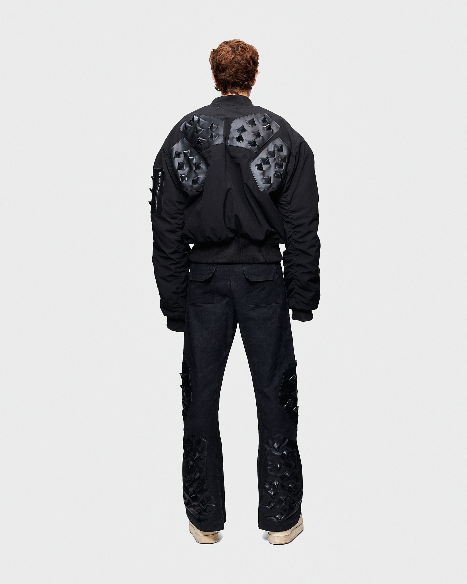 - Croptop padded bomber jacket<br />- Oversize fit<br />- Croco 3-D leather patches<br />- Dropped shoulders