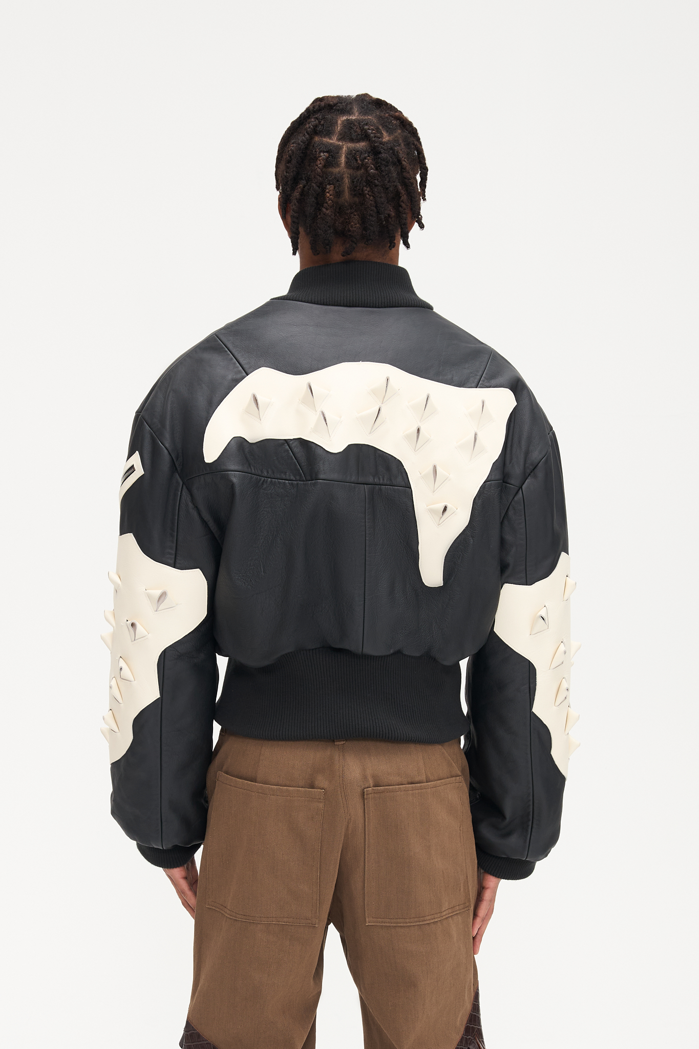 - Oversized fit<br />- Croptop bomber<br />- White 3-D croco natural leather patches