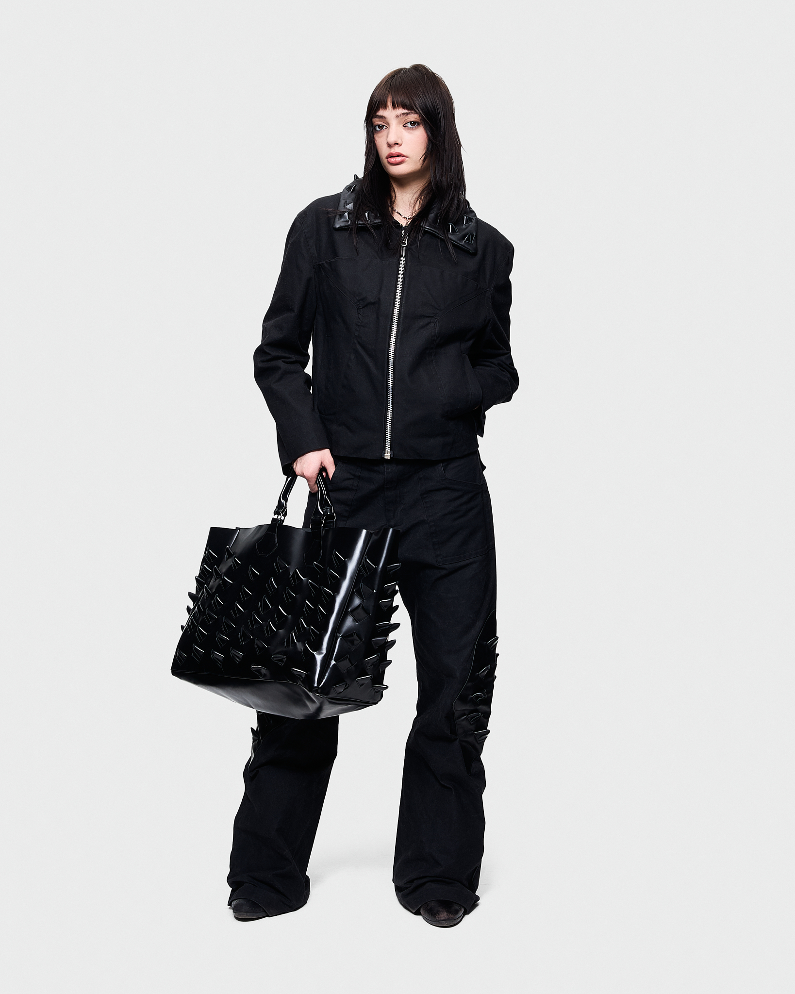 - Canvas Workwear jacket<br />- Straight fit<br />- Leather collar detailed with inlaid croco spikes