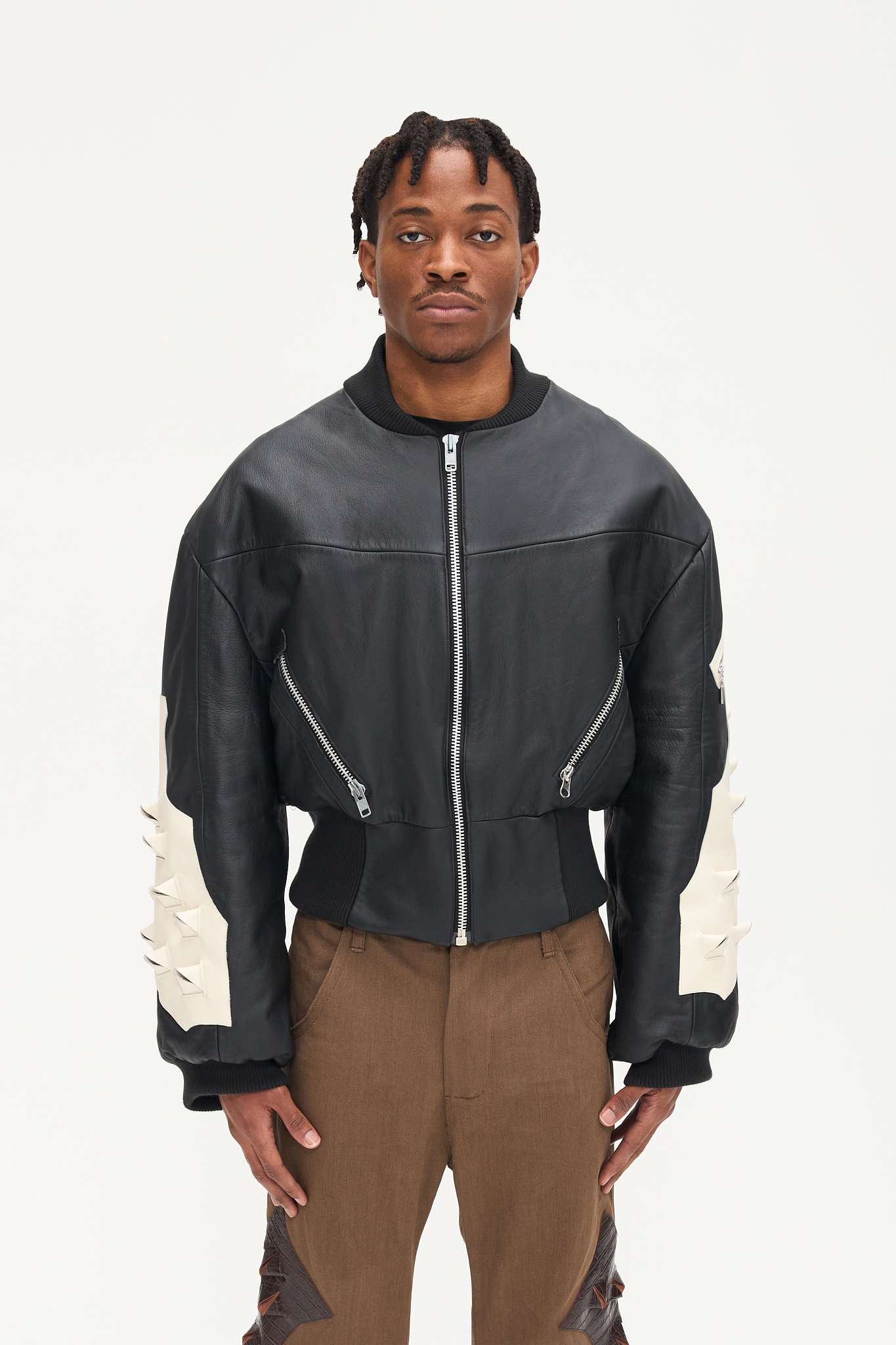 - Oversized fit<br />- Croptop bomber<br />- White 3-D croco natural leather patches