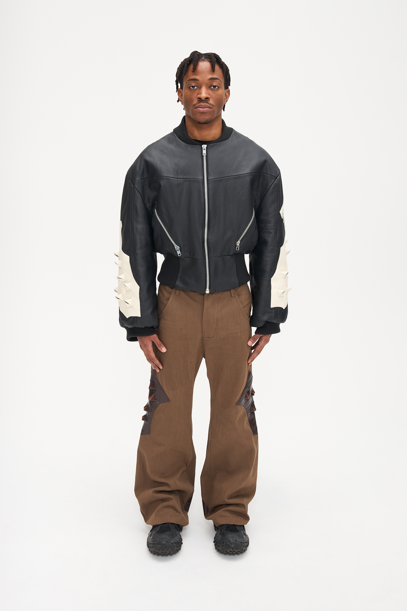 - Oversized fit<br />- Croptop bomber<br />- White 3-D croco natural leather patches