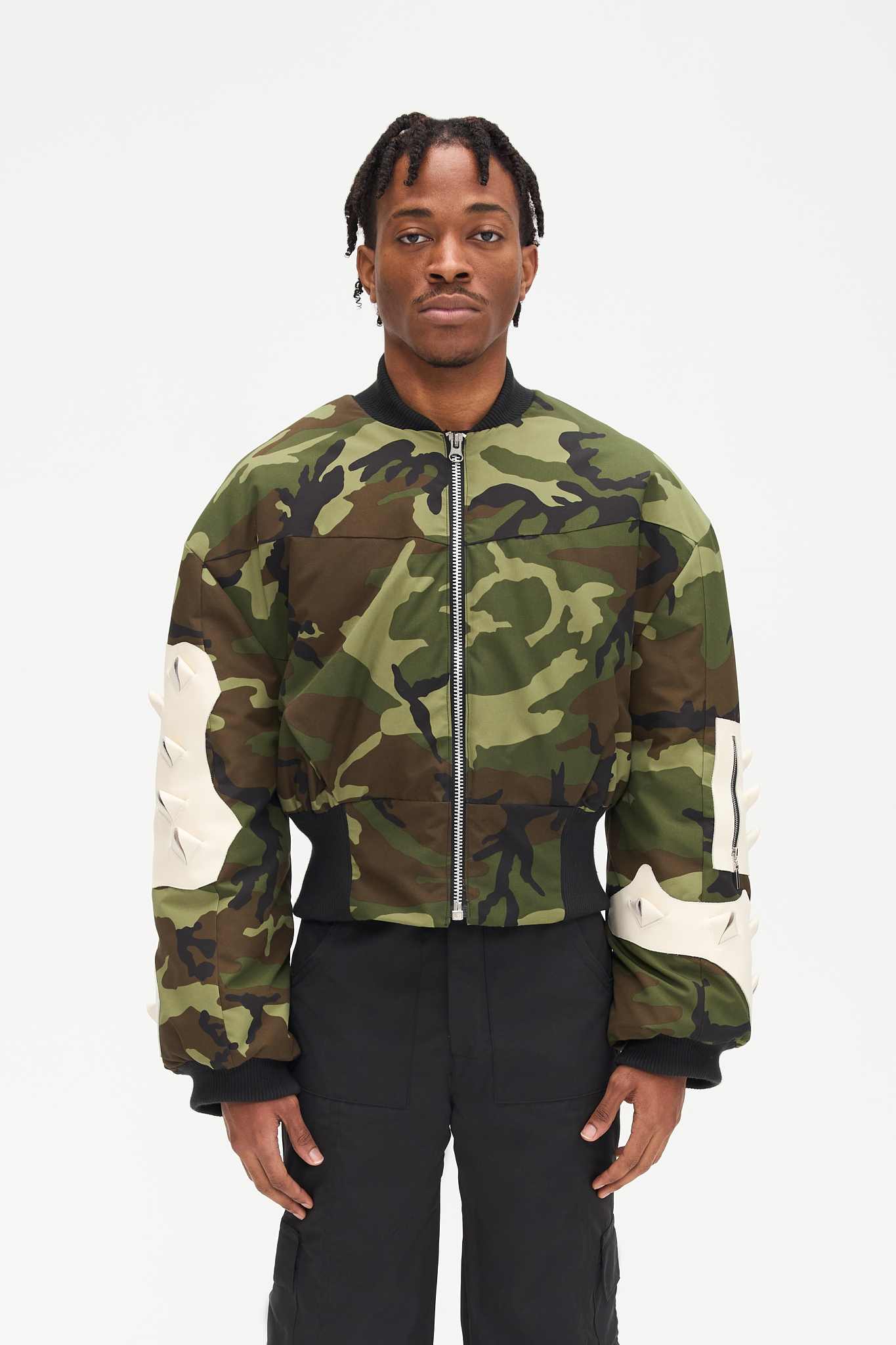 - Oversize fit<br />- Croptop bomber<br />- Nylon water resistant fabric<br />- White croco 3-D natural leather patches<br />